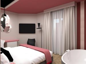 Posteľ alebo postele v izbe v ubytovaní Parc Hotel Flora S