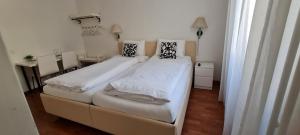 Letto o letti in una camera di Hotel Corona