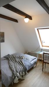 Säng eller sängar i ett rum på Schönes Apartment vor den Toren Hamburgs - keine Monteurwohnung