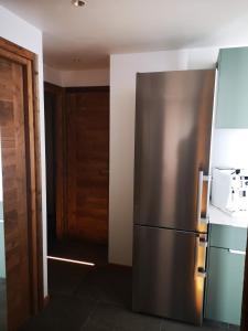 Kuchyň nebo kuchyňský kout v ubytování MyHome - Très Beau T3 refait à neuf - Tichot Val Claret