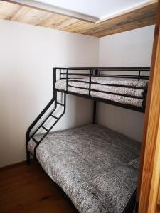 Postel nebo postele na pokoji v ubytování MyHome - Très Beau T3 refait à neuf - Tichot Val Claret