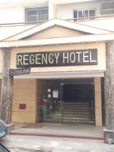 a recovery hotel sign on the front of a building at Regency Hotel in Cairo