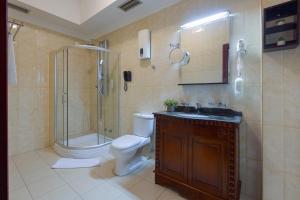 Koupelna v ubytování Garni Hotel Planeta Inn