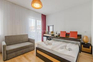 Postel nebo postele na pokoji v ubytování Villa Łeba Pokoje & Apartamenty