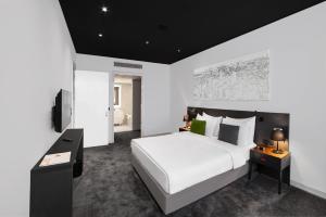 Voodi või voodid majutusasutuse Crowne Plaza Podgorica by IHG toas