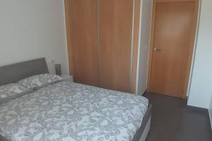 En eller flere senge i et værelse på Super appartement à 200m de la plage à « Portisel » + 17 billeder