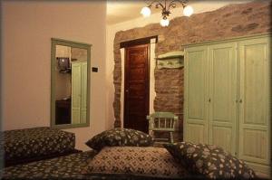 Postel nebo postele na pokoji v ubytování Hotel Les Granges