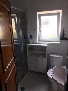 Ένα μπάνιο στο Lagos Room Booking