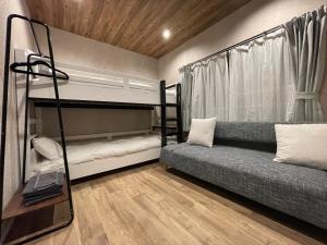 TOCORO. Mt.Fuji Station HOSTEL Kawaguchiko客房内的一张或多张床位