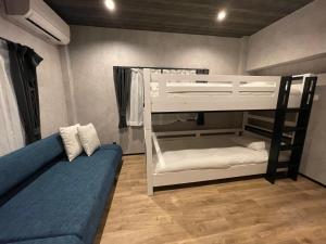TOCORO. Mt.Fuji Station HOSTEL Kawaguchiko客房内的一张或多张床位