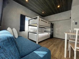 TOCORO. Mt.Fuji Station HOSTEL Kawaguchiko客房内的一张或多张床位
