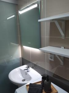 Kúpeľňa v ubytovaní Yumbo Holiday Apartment - Tanife ROOS + 3 fotografie