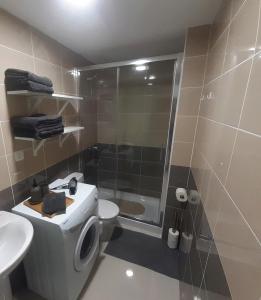 Kúpeľňa v ubytovaní Yumbo Holiday Apartment - Tanife ROOS
