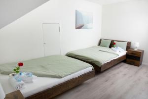 Postel nebo postele na pokoji v ubytování Simpel Rooms Vintage Rustica nähe Uni, Olma, Spital