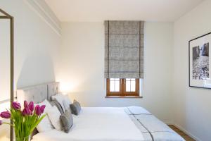 Posteľ alebo postele v izbe v ubytovaní Hotel i Restauracja na Skarpie