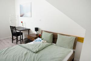 Postel nebo postele na pokoji v ubytování Simpel Rooms Vintage Rustica nähe Uni, Olma, Spital