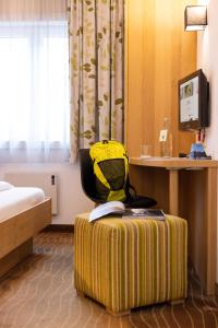 Ein Bett oder Betten in einem Zimmer der Unterkunft Hotel Grüner Baum