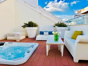 Posedenie v ubytovaní iloftmalaga Deluxe Calle Nueva IV + 2 fotografie