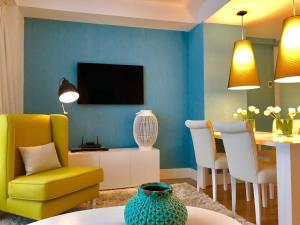 Televízia a/alebo spoločenská miestnosť v ubytovaní iloftmalaga Deluxe Calle Nueva IV