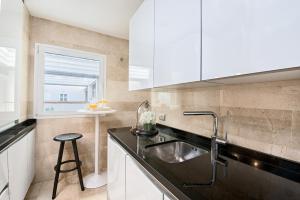 Kuchyňa alebo kuchynka v ubytovaní iloftmalaga Deluxe Calle Nueva IV