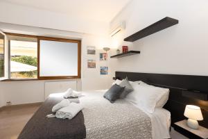 Posteľ alebo postele v izbe v ubytovaní Parioli Garden-Rental in Rome