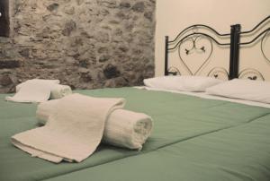 Postel nebo postele na pokoji v ubytování Il Castello + 22 fotografií