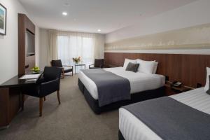 Postel nebo postele na pokoji v ubytování Rydges Latimer Christchurch