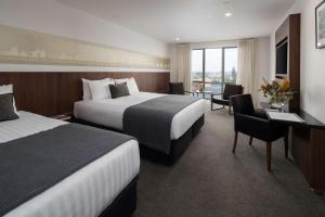 Postel nebo postele na pokoji v ubytování Rydges Latimer Christchurch
