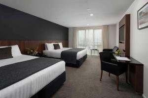 Postel nebo postele na pokoji v ubytování Rydges Latimer Christchurch
