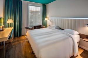 Postel nebo postele na pokoji v ubytování Park Inn by Radisson Stuttgart