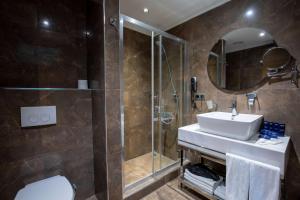 a bathroom with a sink and a shower at Park Inn by Radisson Istanbul Asia Kavacik in Istanbul