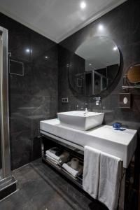 a bathroom with a sink and a mirror at Park Inn by Radisson Istanbul Asia Kavacik in Istanbul