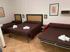 Krevet ili kreveti u jedinici u okviru objekta Residence Cimone SuperSci