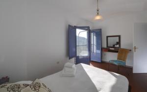 Łóżko lub łóżka w pokoju w obiekcie Stunning home Benamahoma 4 Bed - Sierra Grazalema