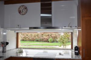 A kitchen or kitchenette at Vuelta Abajo Un lujo a tu alcance en Cartes