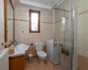 Kúpeľňa v ubytovaní Evilion Villa
