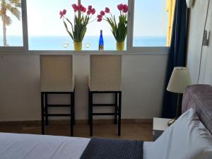 Katil atau katil-katil dalam bilik di Magic on the sea-suites with a private jacuzzi and a private sea view
