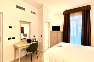 TV a/nebo společenská místnost v ubytování BB Hotels Smarthotel Bailey's