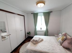 Posteľ alebo postele v izbe v ubytovaní Apartamento Lurra Barrika