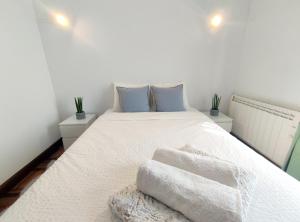 Posteľ alebo postele v izbe v ubytovaní Apartamento Lurra Barrika