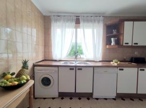 Kuchyňa alebo kuchynka v ubytovaní Apartamento Lurra Barrika