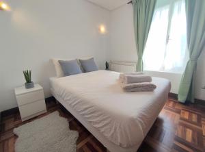 Posteľ alebo postele v izbe v ubytovaní Apartamento Lurra Barrika