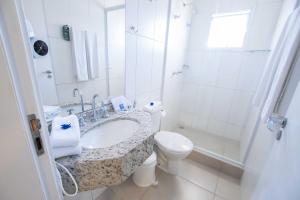 Ett badrum på Hotel VillaReal Charme