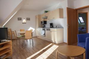 Kuchyň nebo kuchyňský kout v ubytování Seepark Burhave, Burhave