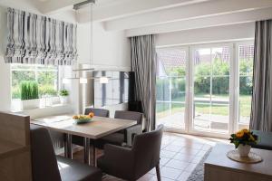 Posezení v ubytování Seepark Burhave, Burhave + 16 fotografií