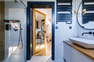 Kúpeľňa v ubytovaní APARTAMENTY NOVA BIAŁKA