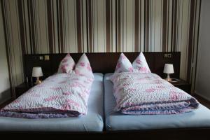 Postel nebo postele na pokoji v ubytování Haus Hanseatic Ferienwohnungen