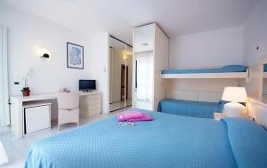 Postel nebo postele na pokoji v ubytování Hotel Valle Verde