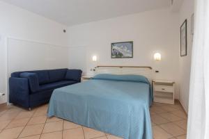 Postel nebo postele na pokoji v ubytování Hotel Valle Verde