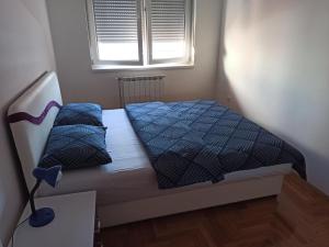 Кровать или кровати в номере BK Apartment, Istocno Sarajevo, Lukavica